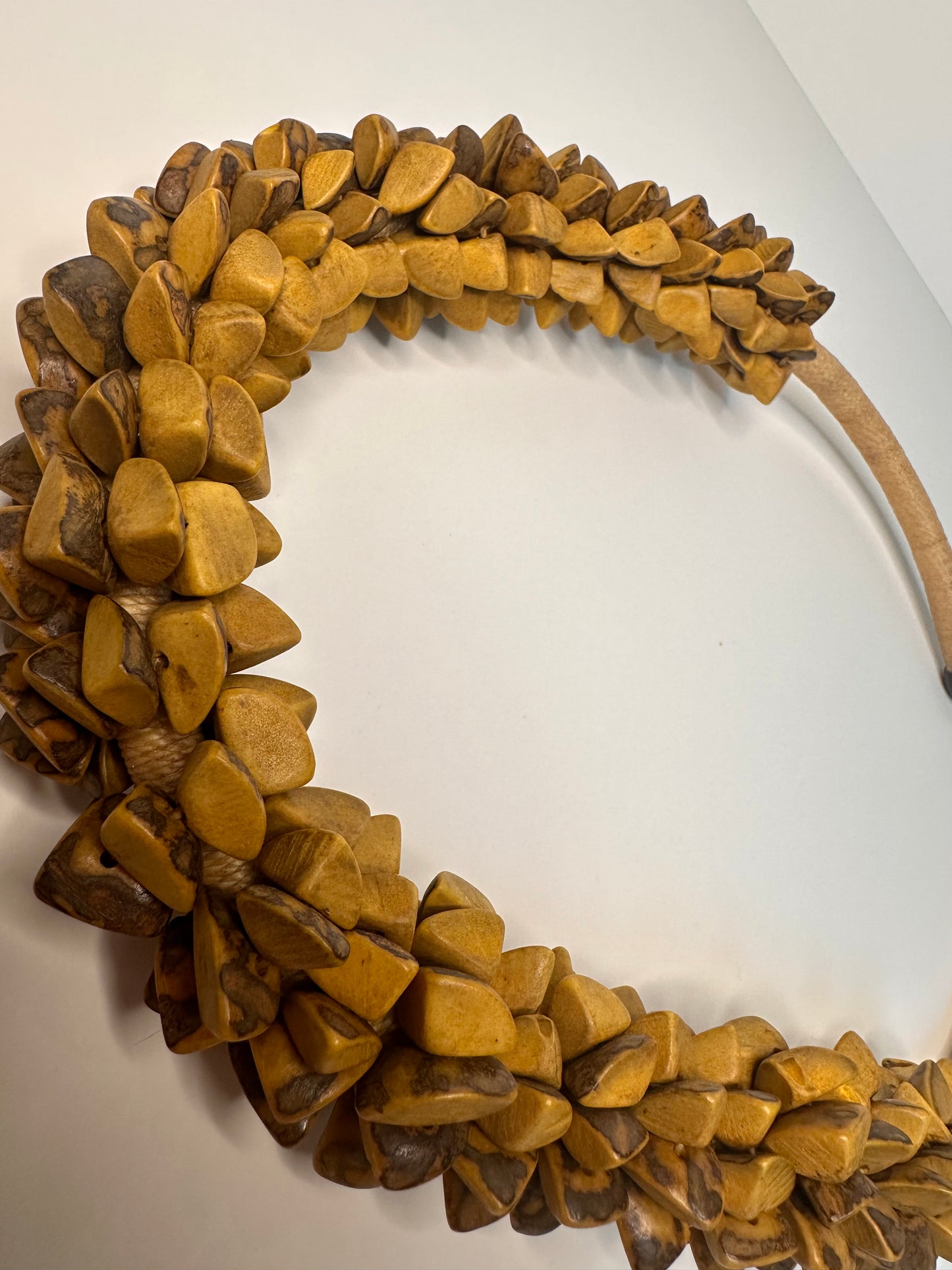 Close up of polished buriti palm in Rio Negro artisan necklace