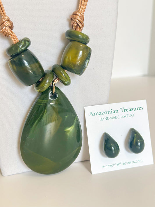 Green resin drop earrings matching the cotton necklace set.