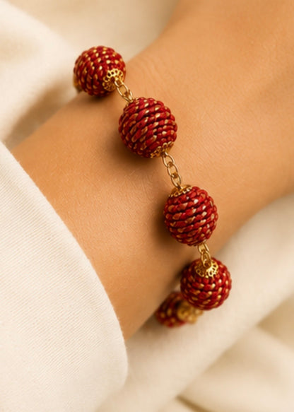 Red Golden Grass sphere bracelet and earrings handcrafted from Brazilian Capim Dourado