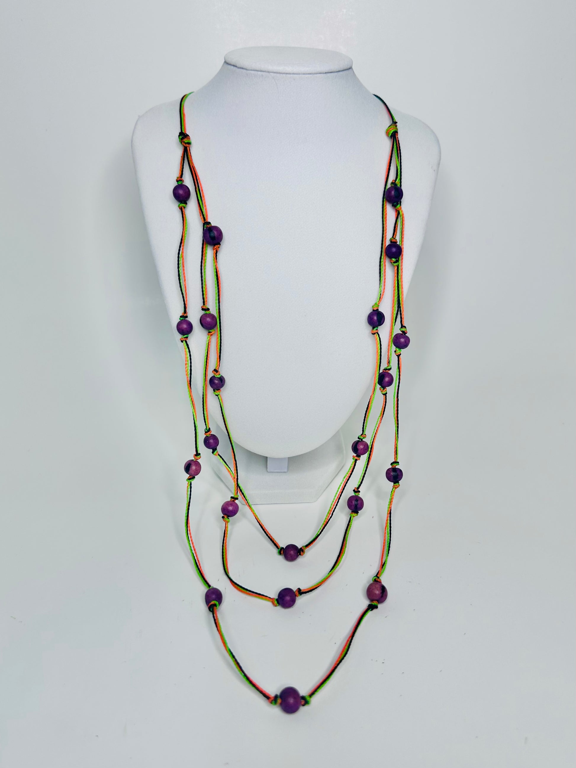 handmade bio jewelry. Necklace made of linen and açaí beads.