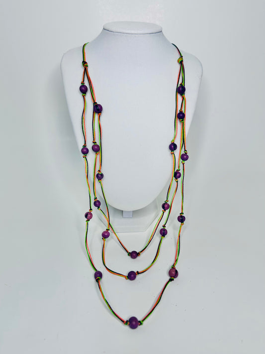 handmade bio jewelry. Necklace made of linen and açaí beads.