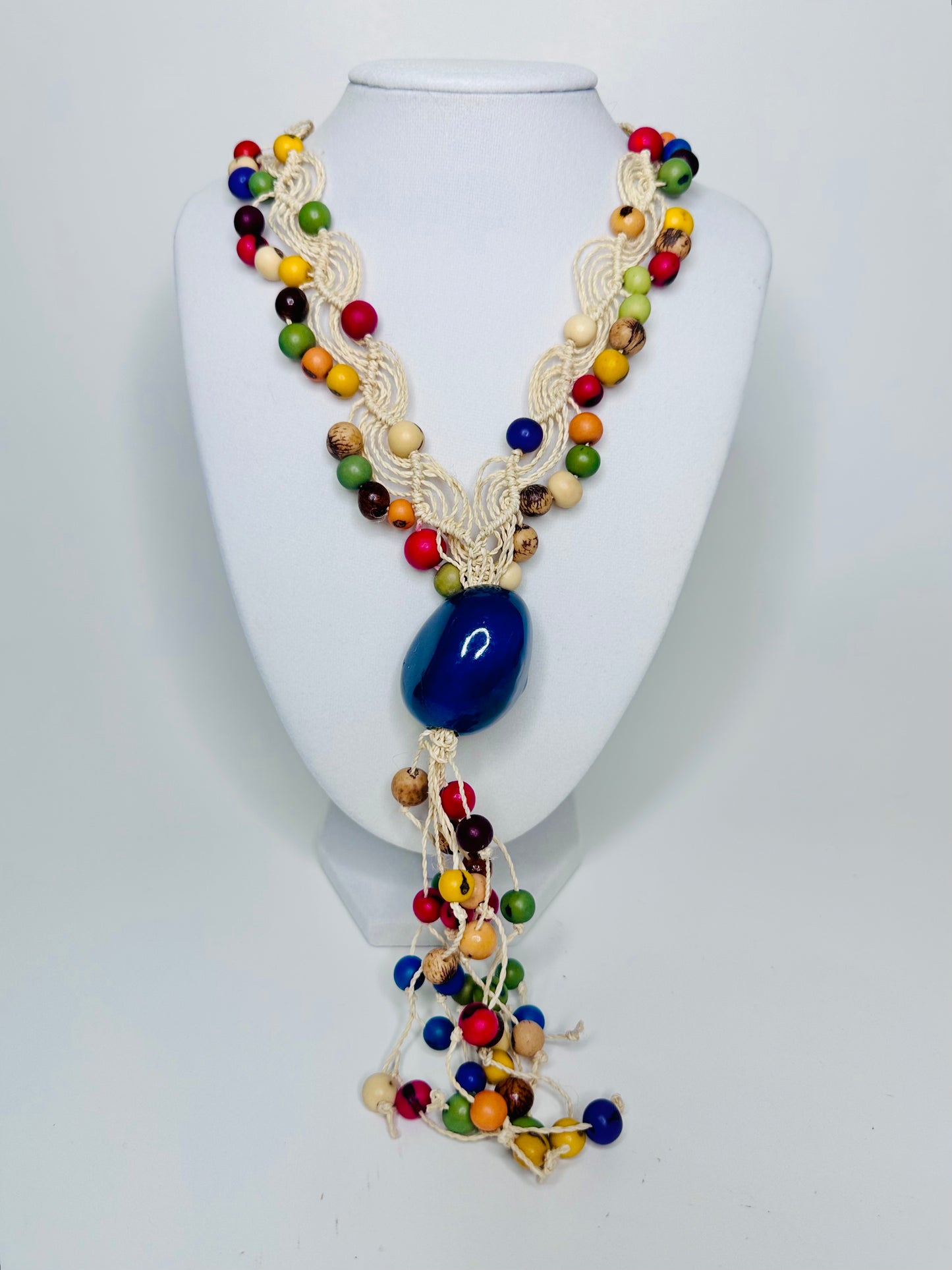 Handcrafted bio necklace jewelry made of tucum fiber, delicate jarina, and açaí seeds.