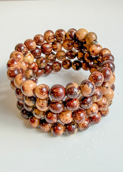 Açaí Terra Cuff handcrafted with natural Açaí seeds by Brazilian artisans