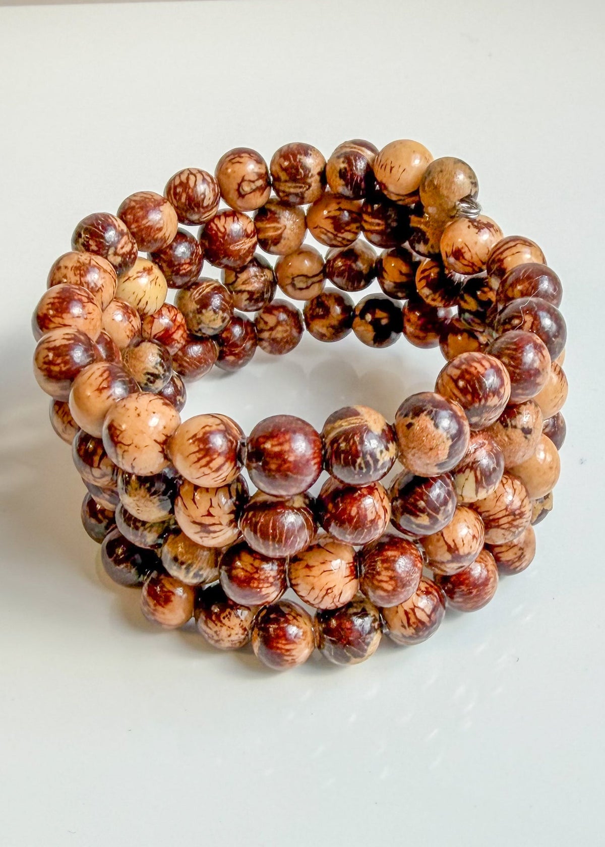 Açaí Terra Cuff handcrafted with natural Açaí seeds by Brazilian artisans