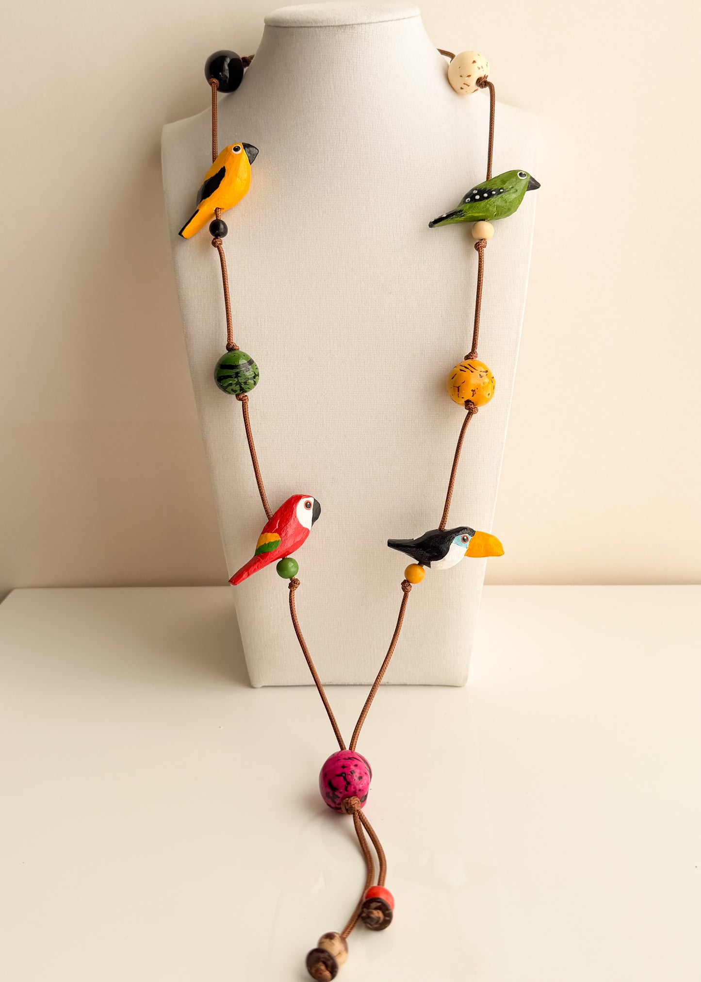 Amazon Birds necklace handcrafted with colorful Buriti and Paxiúba bird shapes in Brazil