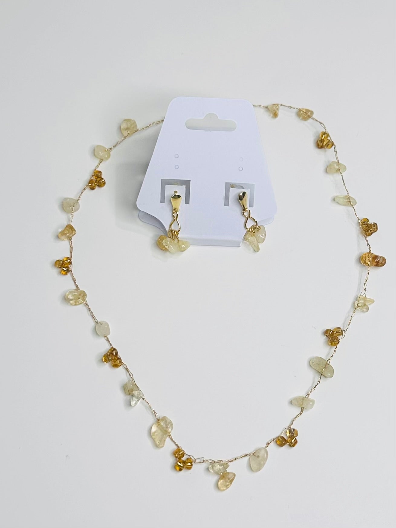 Yellow Necklace and earrings set on gold thread