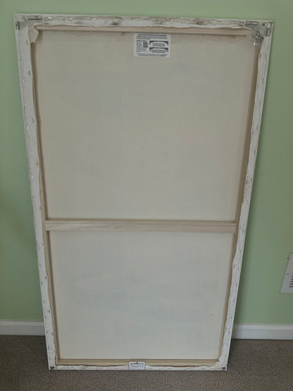 Back view of stretched canvas oil painting, professionally mounted and ready to hang

