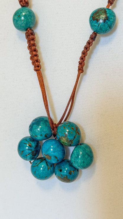 Brazilian artisan necklace with turquoise tinted Açaí seeds and Paxiúba