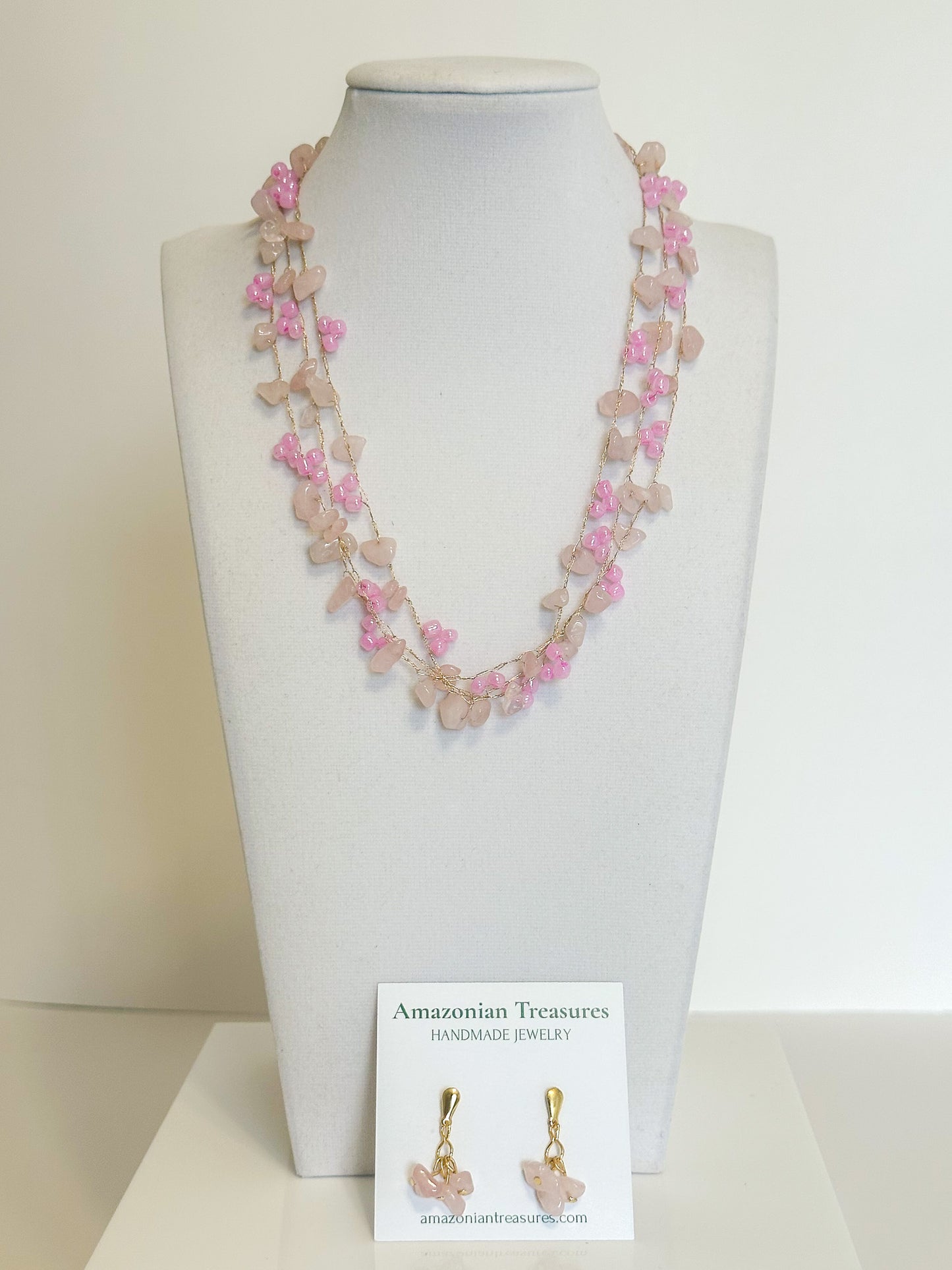 Brazilian gemstone necklace with pink stones and glass beads on golden thread