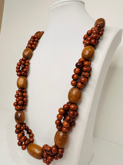 Brown açaí seed and wood artisan necklace close-up