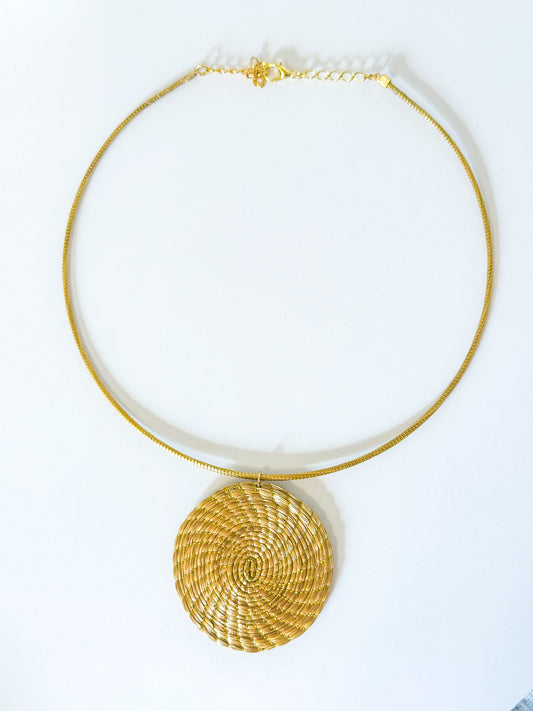Circle of Life capim dourado circular pendant necklace handcrafted in Brazil.