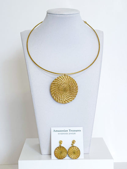 Circle of Life golden grass necklace and earrings set handcrafted with capim dourado by quilombola artisans.