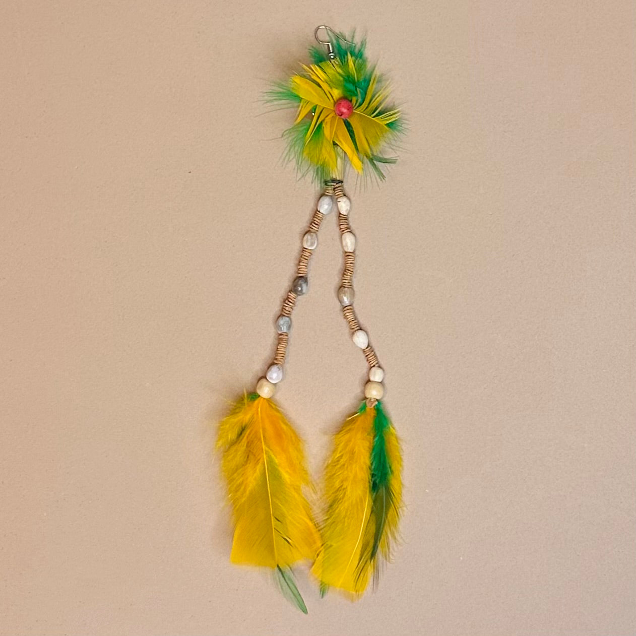 Colorful feather one ear earring detail