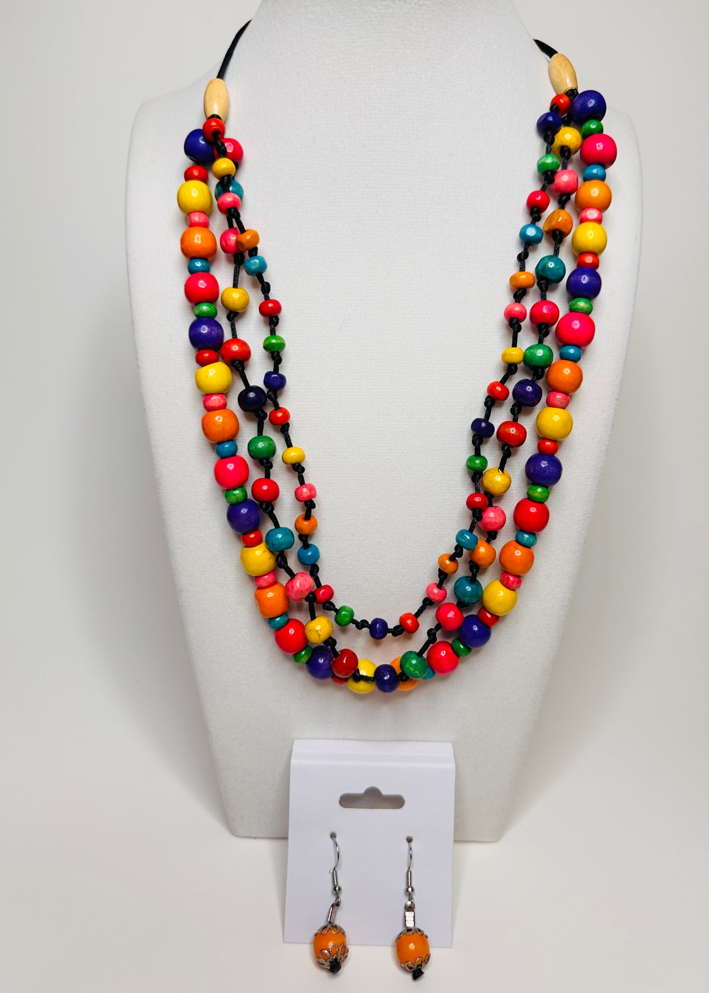 Colorful reclaimed wood necklace and earrings set handmade by Brazilian artisan 