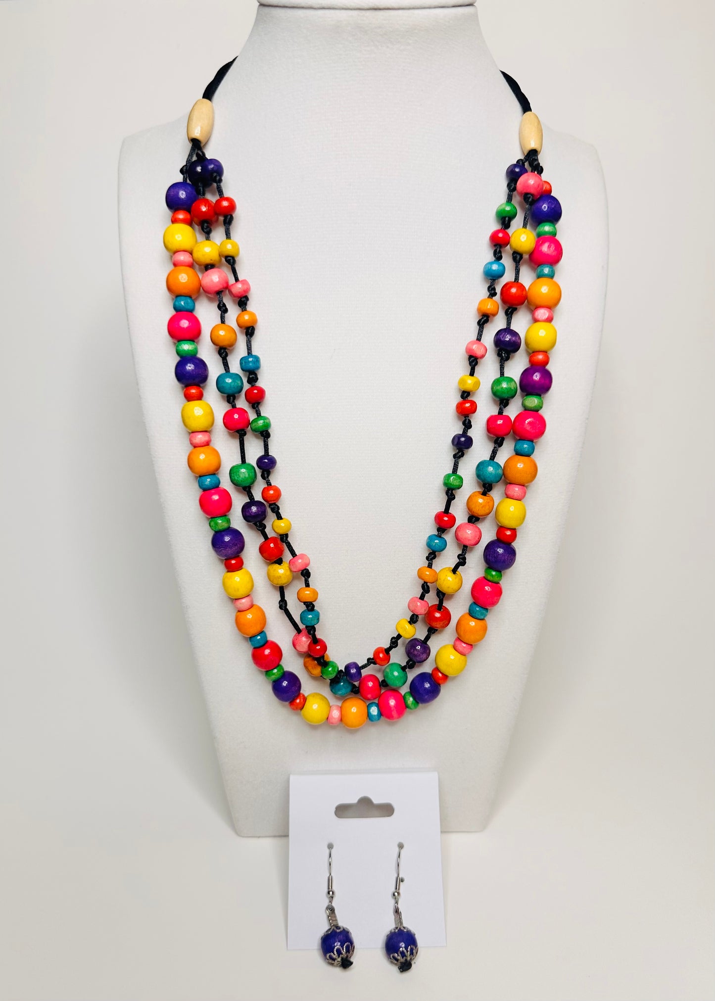 Colorful reclaimed wood necklace and earrings set handmade by Brazilian artisan association