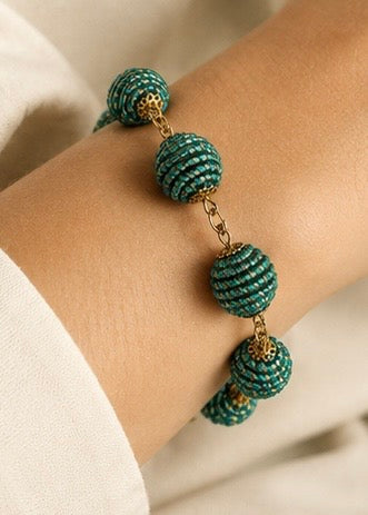 Green Golden Grass sphere bracelet and earrings handcrafted from Brazilian Capim Dourado