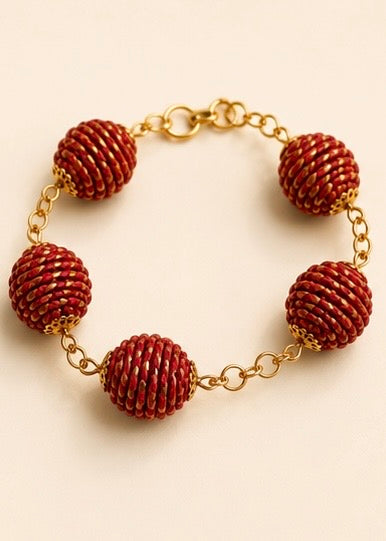 Red Golden Grass sphere bracelet and earrings handcrafted from Brazilian Capim Dourado