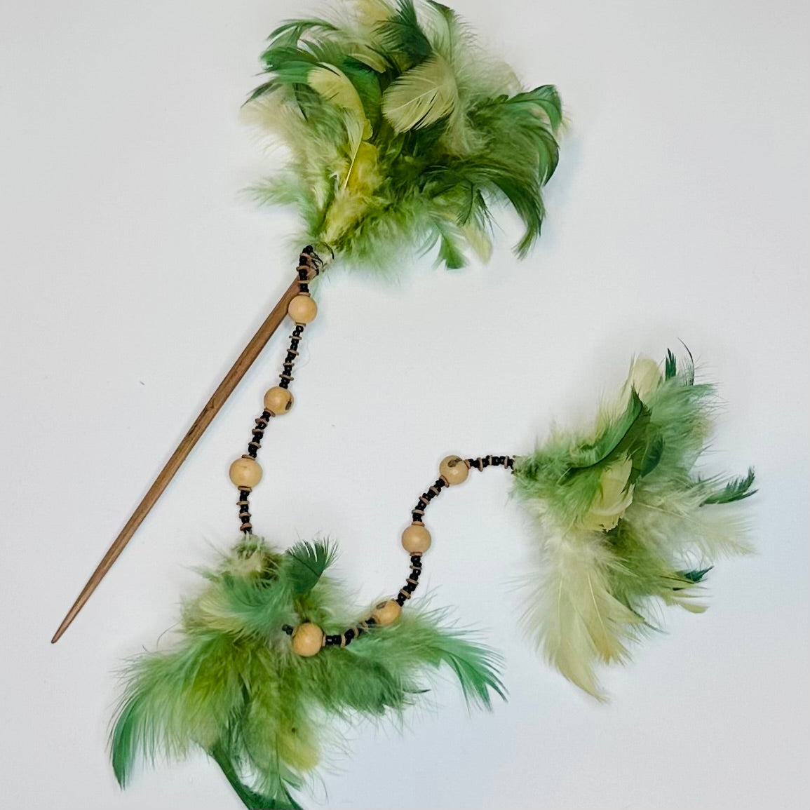 Eco handmade hair clip made with wood and feathers