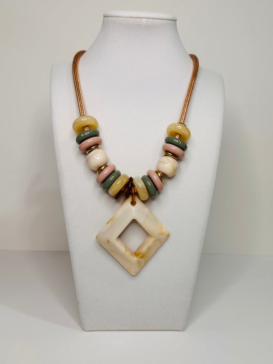 Edge Line Necklace featuring rope cord, geometric resin pendant, and multicolor beads from the Echoes of Brazil collection.
