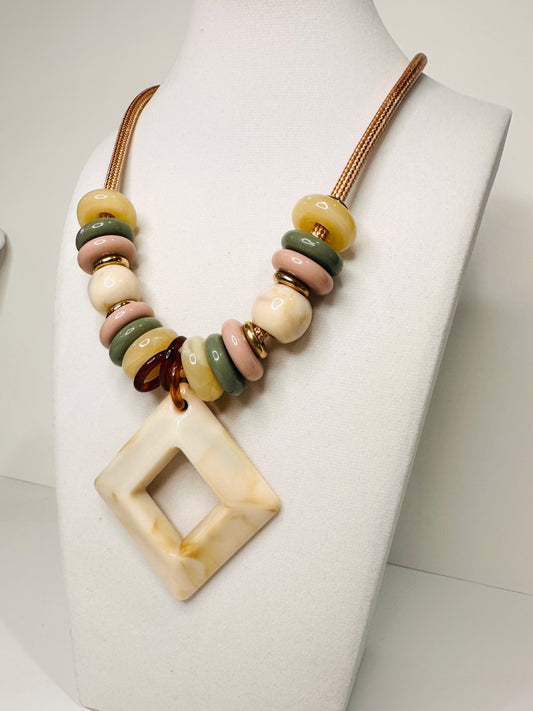 Edge Line Necklace featuring rope cord, geometric resin pendant, and multicolor beads from the Echoes of Brazil collection close-up