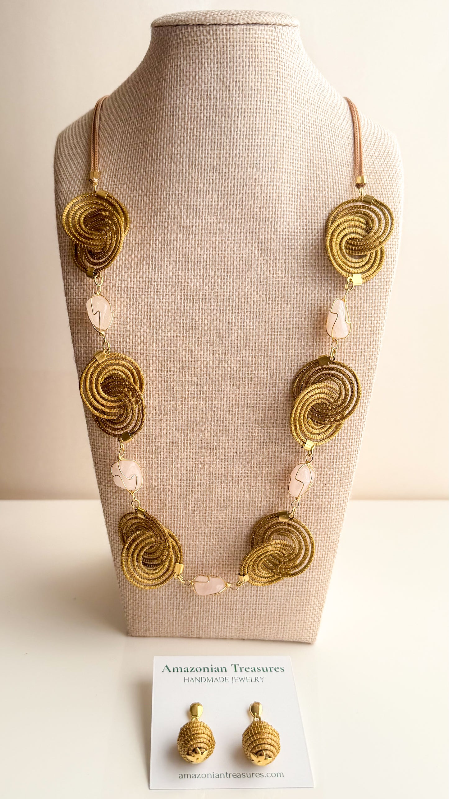 Espiral Dourada Set featuring golden grass spiral necklace and matching earrings handcrafted by quilombola artisans in Brazil 2 