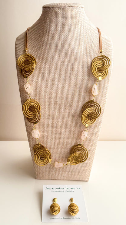 Espiral Dourada Set featuring golden grass spiral necklace and matching earrings handcrafted by quilombola artisans in Brazil 2 