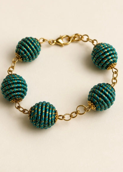 Green Golden Grass sphere bracelet and earrings handcrafted from Brazilian Capim Dourado