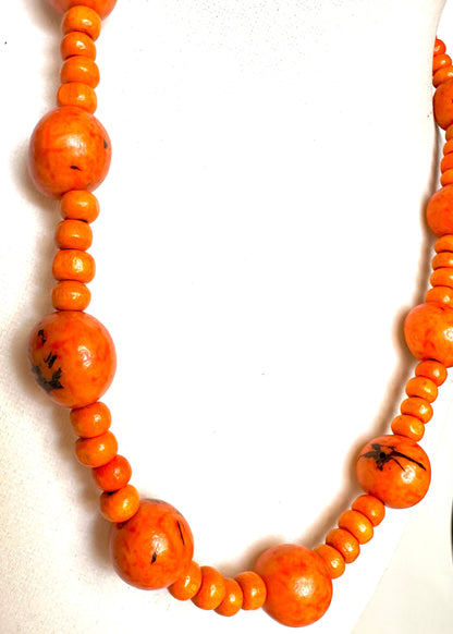 Orange paxiubinha seed necklace with reclaimed wood accents