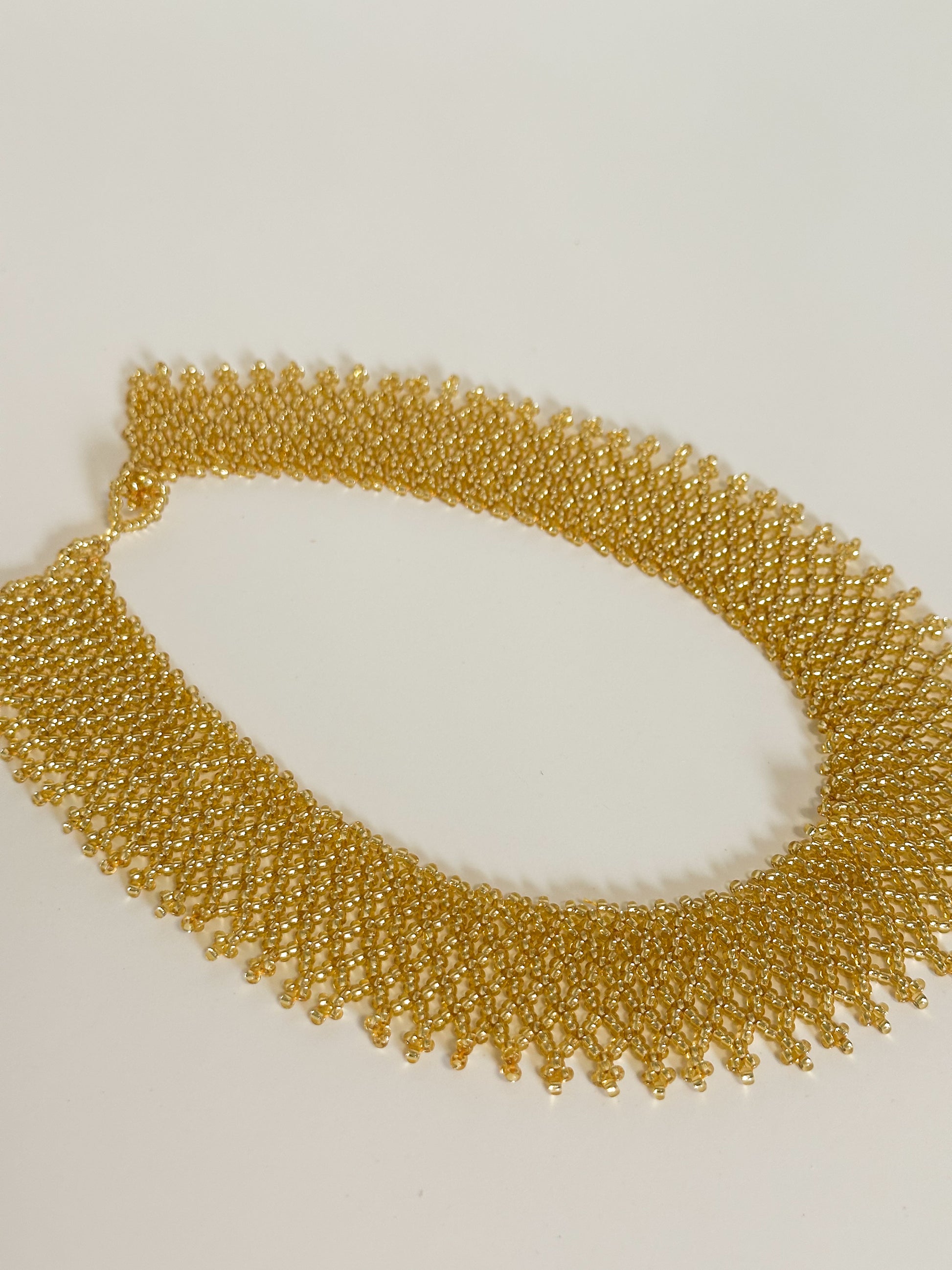 Gold tone Borari beaded collar necklace handmade with glass beads.