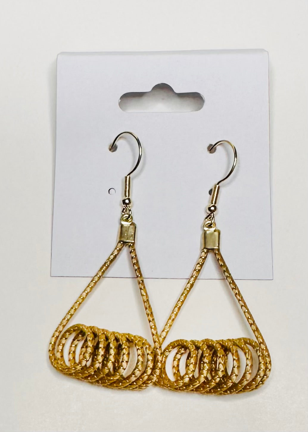 Golden grass earrings handcrafted in Brazil from capim dourado