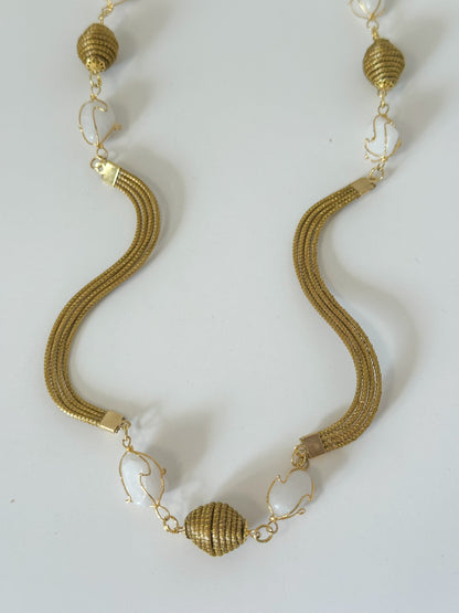 Golden grass necklace set with white gemstone pendant