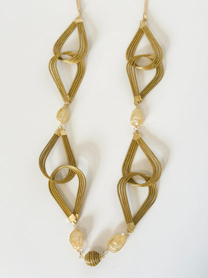 Golden grass necklace with citrine gemstone handcrafted with capim dourado.