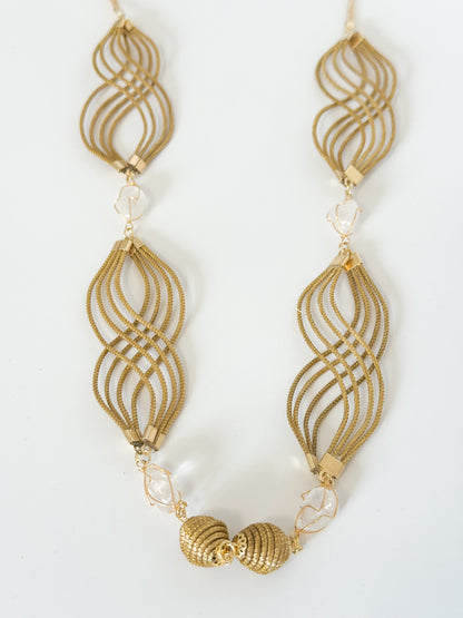 Golden grass necklace with white gemstone handcrafted using capim dourado.