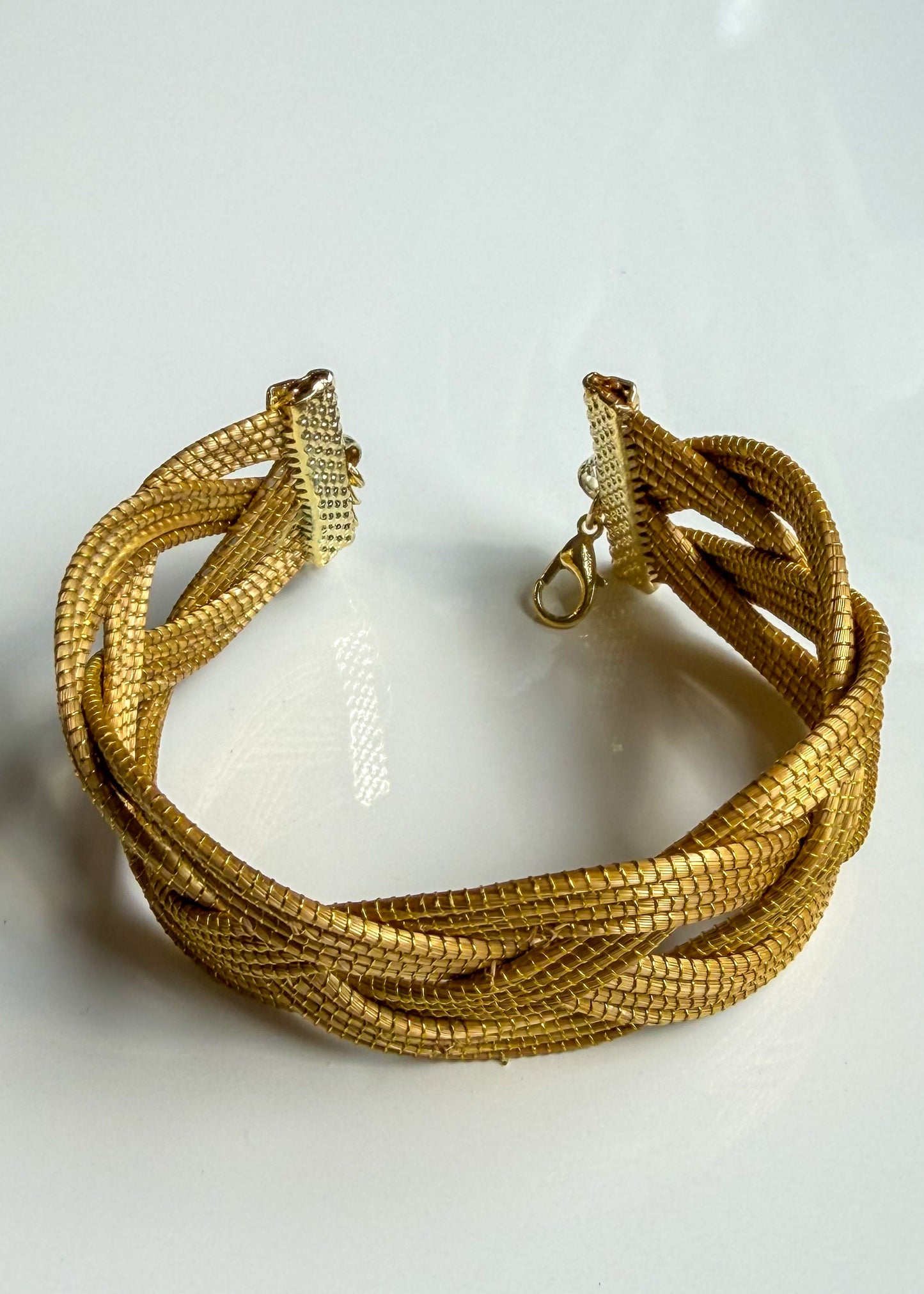 Golden Braid Capim Dourado statement cuff handcrafted in Brazil