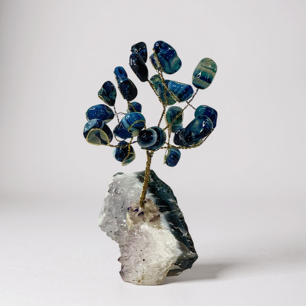 Handcrafted gemstone bonsai tree mounted on natural amethyst crystal base with wired branches and polished gemstone chips. Sodalite Quartz Tree