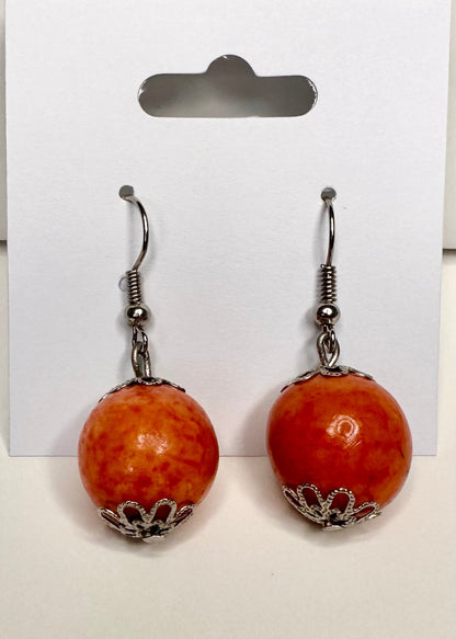 Handmade paxiubinha seed earrings by Amazon women artisans