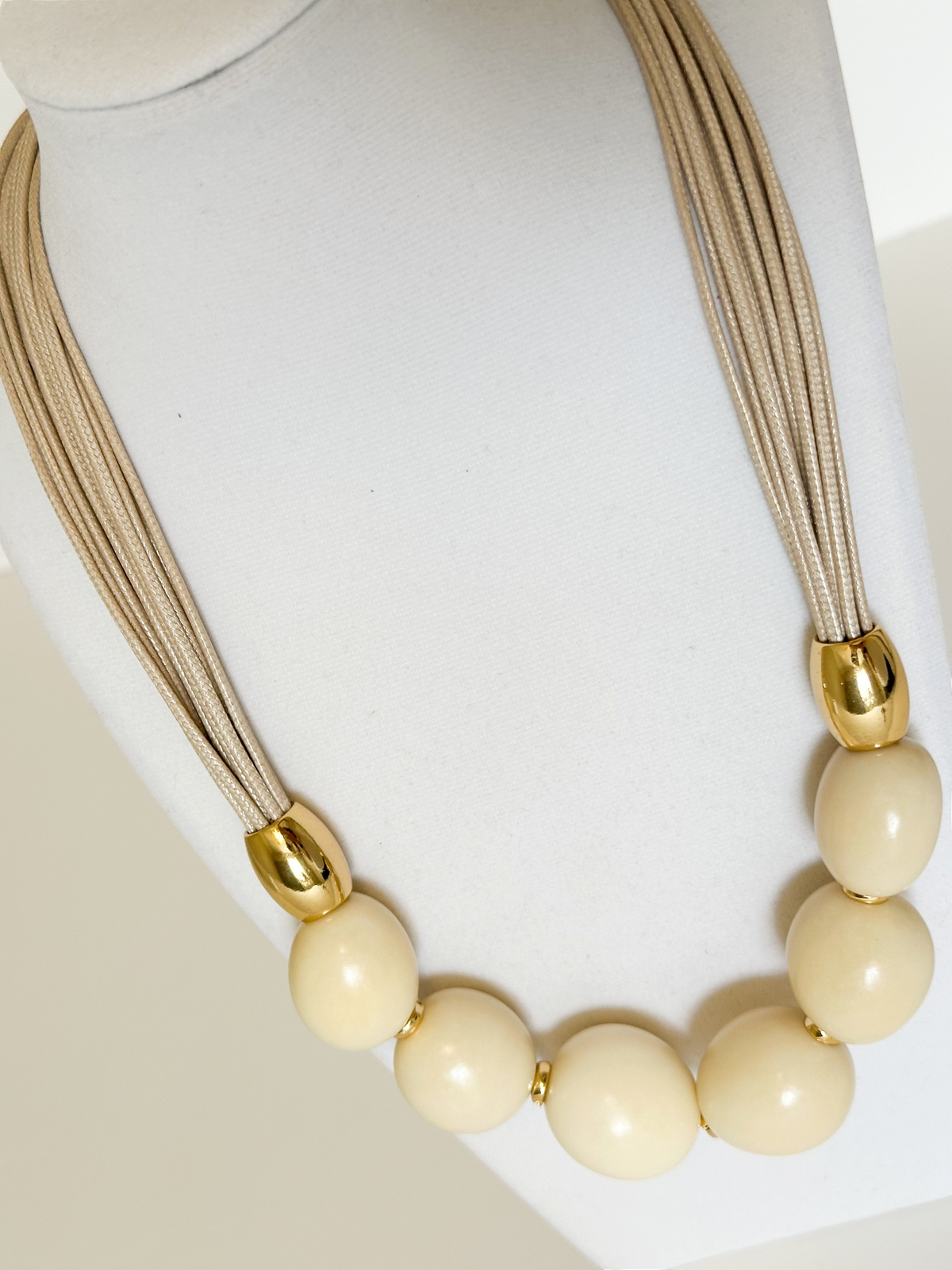 Jarina vegetable ivory beads detail on handmade Amazon necklace.