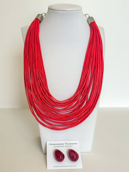 Layered cotton cord necklace with resin earrings designed by a Brazilian jewelry studio. Red