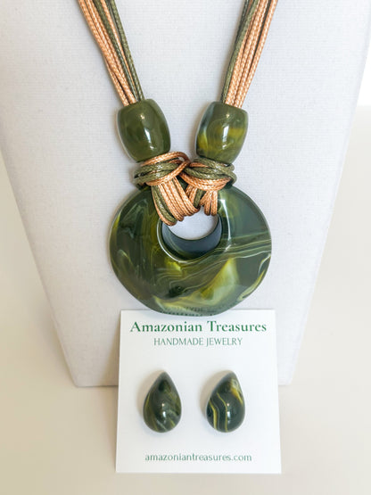 Layered cotton necklace with green resin circle pendant and matching resin earrings