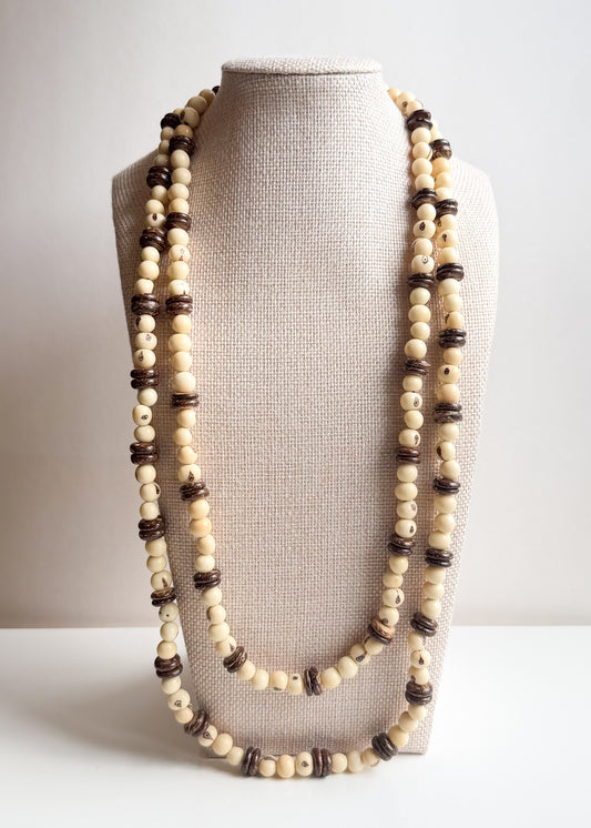 Long layered Açaí seed and coconut shell necklace handcrafted by Brazilian artisans