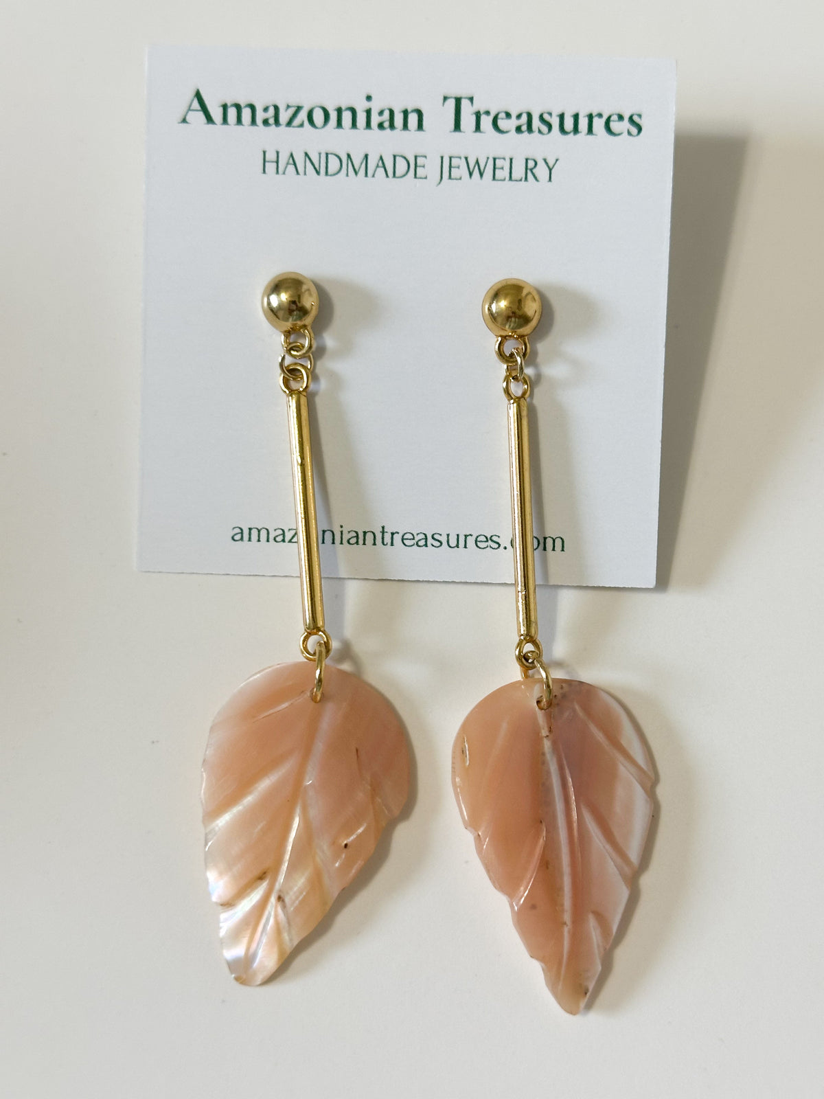 Mother of pearl leaf earrings handcrafted from Amazon shell. Light pink