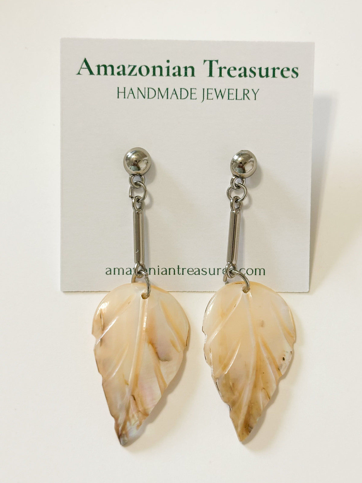Mother of pearl leaf earrings handcrafted from Amazon shell. Light white
