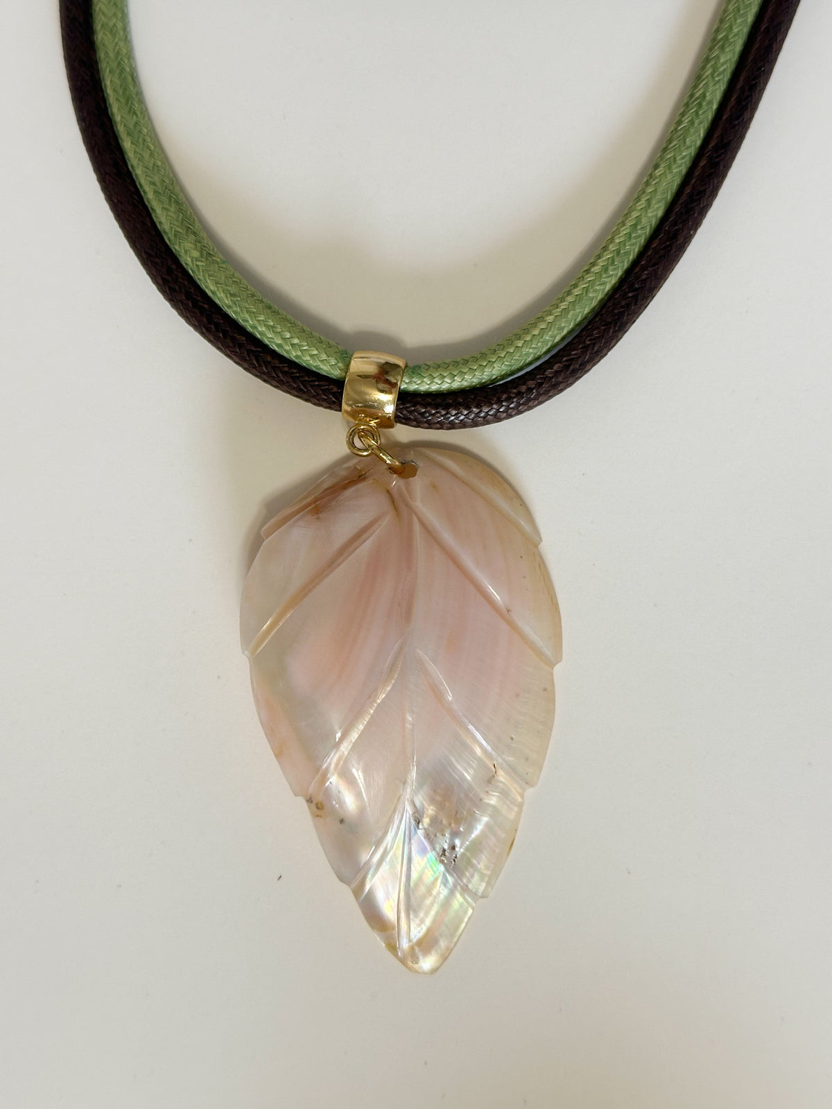 Mother of pearl shell leaf pendant carved from Amazon river shell. Light pink