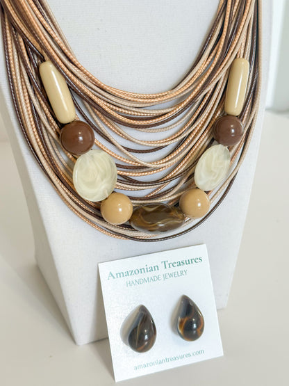 Multi-strand cotton necklace with resin beads and matching resin earrings. Brown