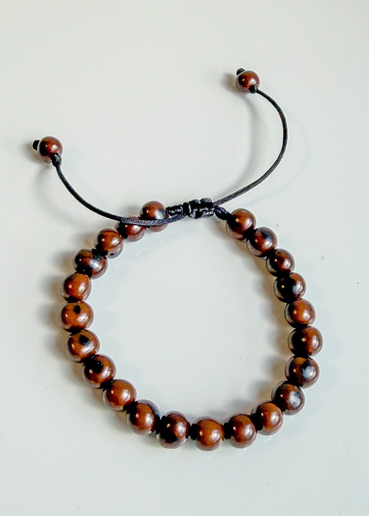 Nature-crafted Amazon seed bracelet brown detail