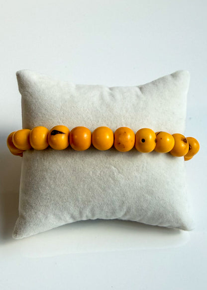 Nature-crafted Amazon seed bracelet yellow
