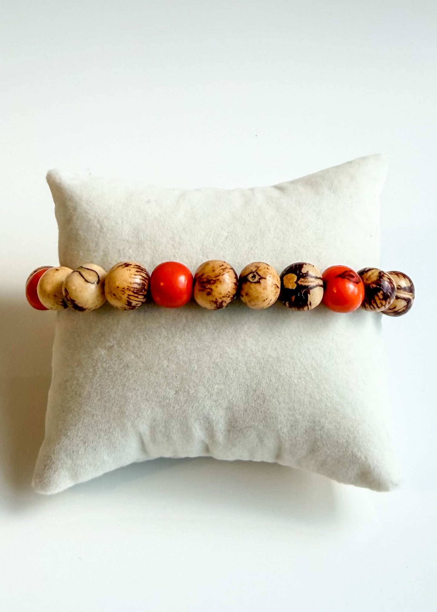 Nature-crafted Amazon seed bracelet orange 