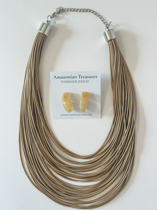 Neutral layered cotton necklace with matching resin earrings.