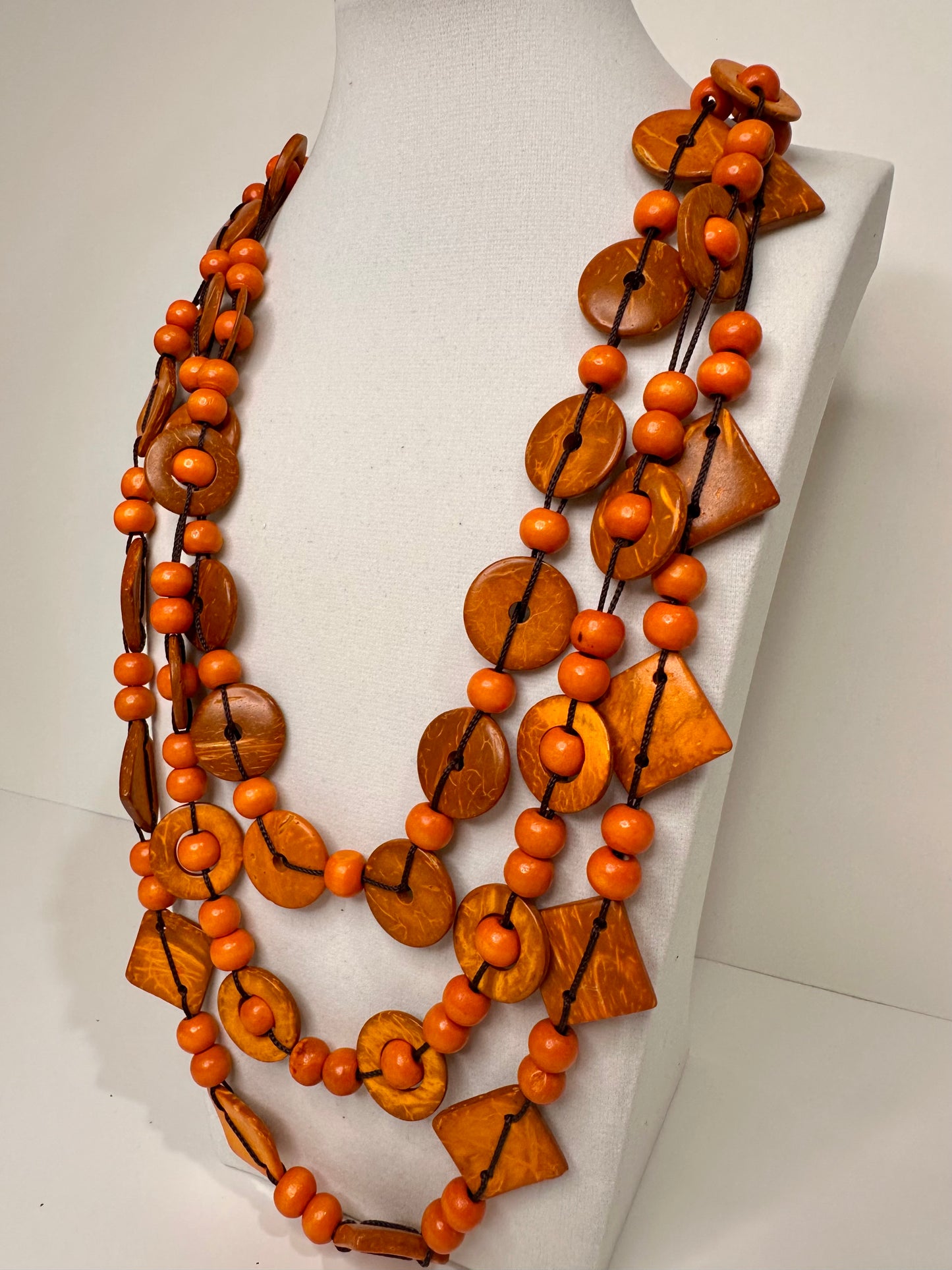 Orange açaí seed layered necklace handmade in Brazil