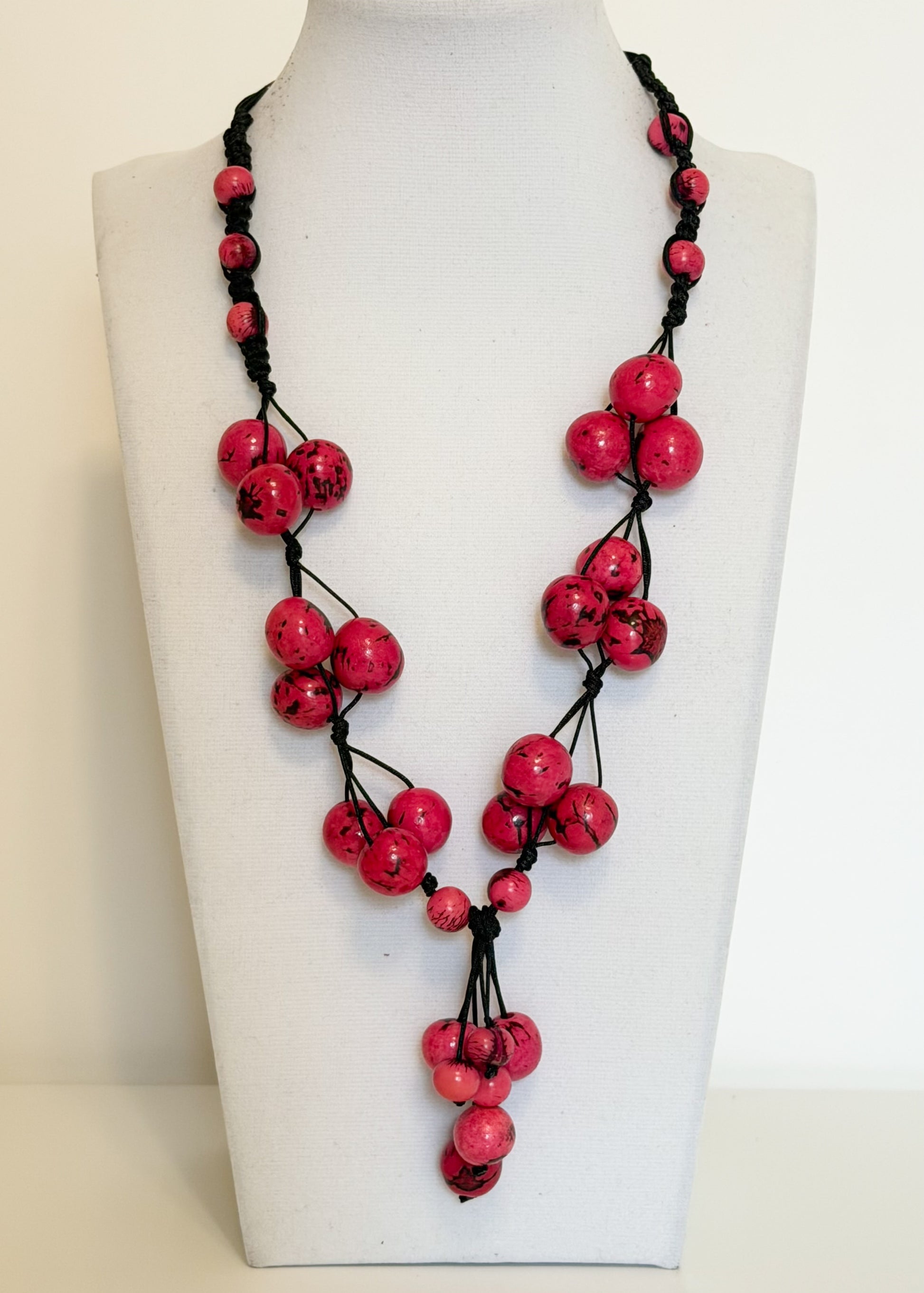 Pink Açaí seed statement necklace handcrafted by Brazilian artisans
